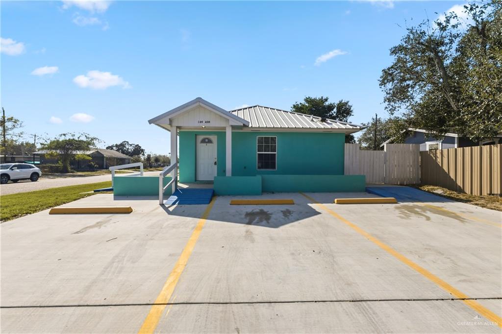 109 Ash Street, Unit B Donna, TX 78537 - Photo 2 of 14 a view of outdoor space yard and front view of a house