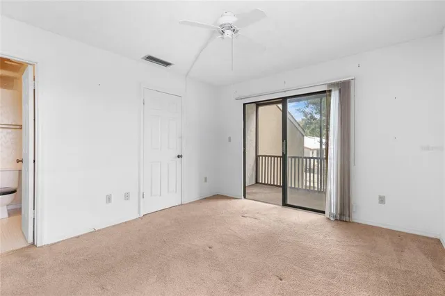 a view of a room with large windows