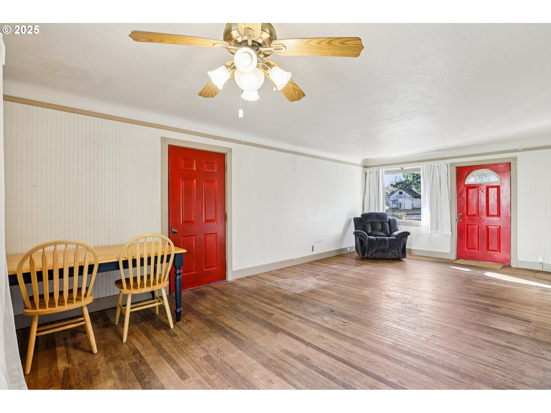 224 Northeast 92nd Place Portland, OR 97220 - Photo 11 of 43 a view of livingroom with furniture and wooden floor