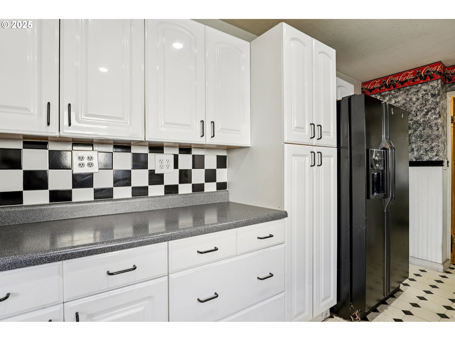 224 Northeast 92nd Place Portland, OR 97220 - Photo 18 of 43 a kitchen with cabinets and window