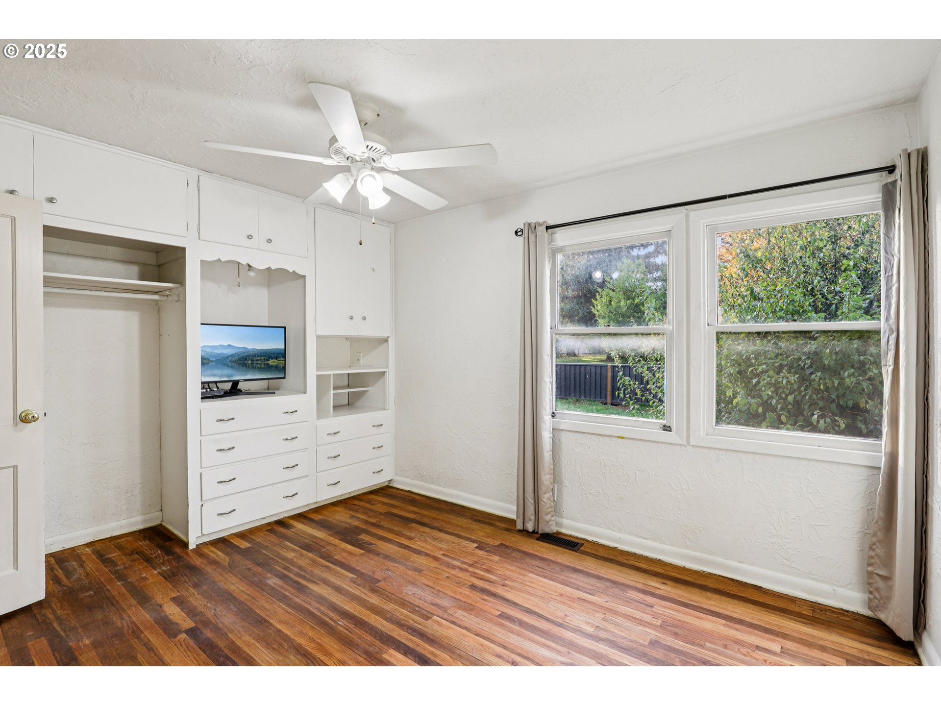 224 Northeast 92nd Place Portland, OR 97220 - Photo 24 of 43 an empty room with fan and windows