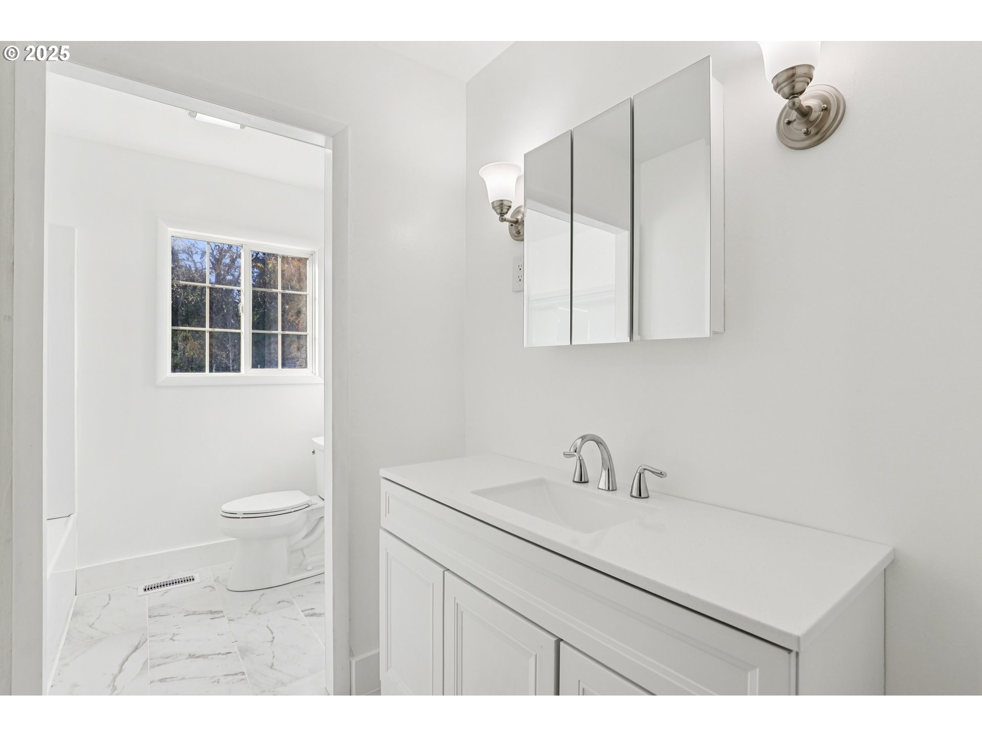 224 Northeast 92nd Place Portland, OR 97220 - Photo 36 of 43 a bathroom with a sink toilet and mirror
