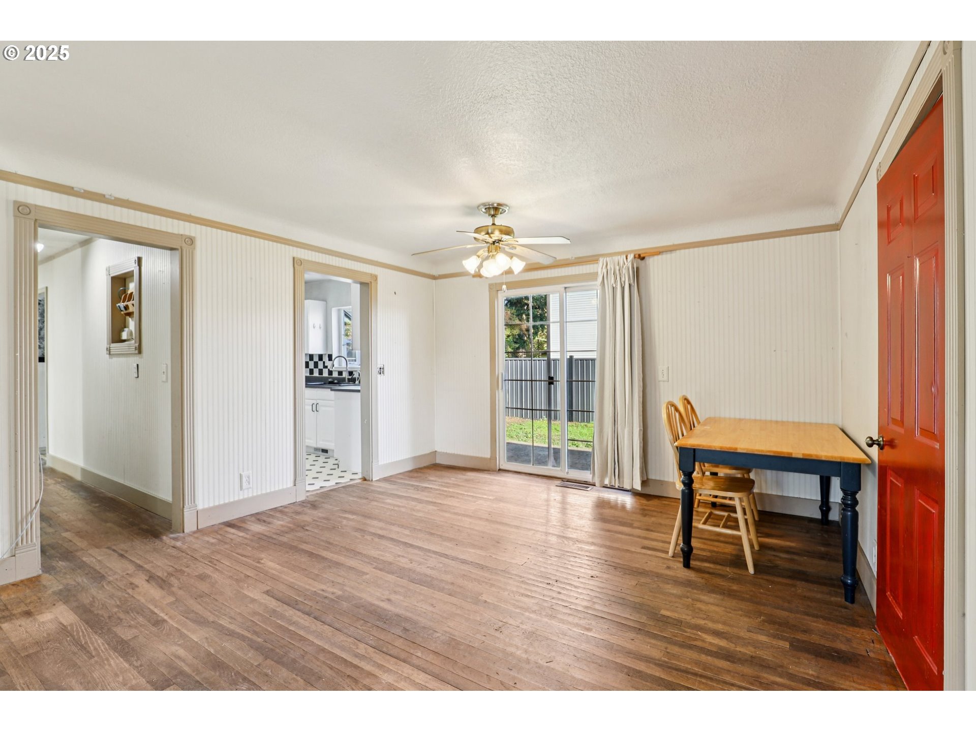 224 Northeast 92nd Place Portland, OR 97220 - Photo 10 of 43 a living room with furniture and a wooden floor