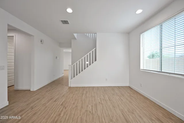 a view of entryway with wooden floor