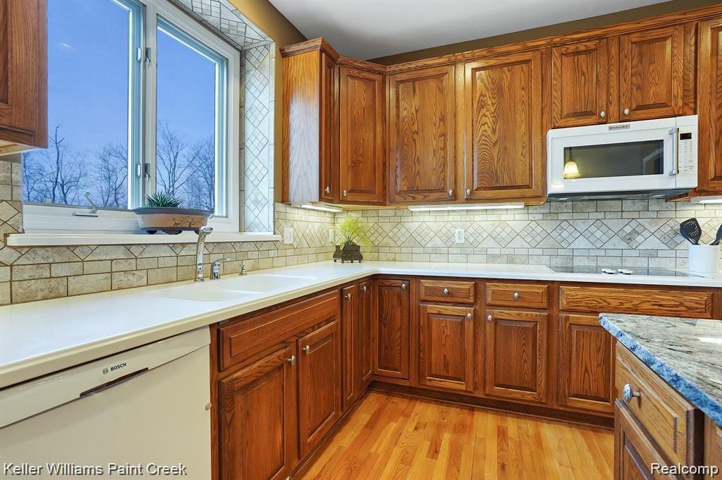 3599 Vineyard Springs Court Rochester, MI 48306 - Photo 40 of 62 A beautiful view awaits over the sink