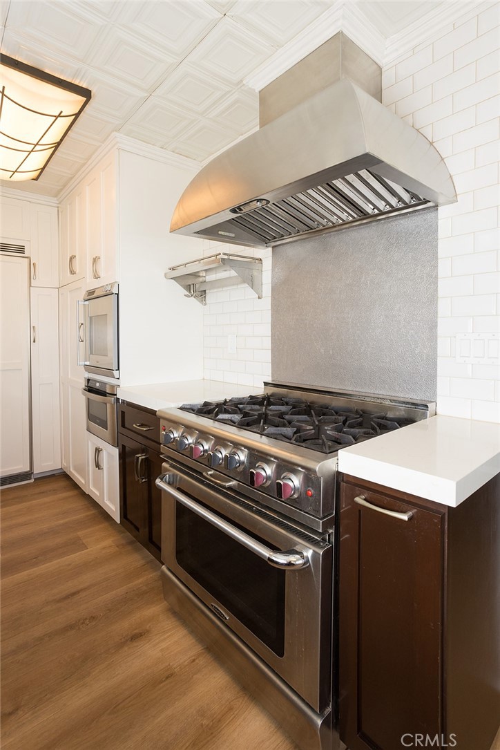 1118 East Joel Street Carson, CA 90745 - Photo 16 of 35 a kitchen with a stove and a microwave