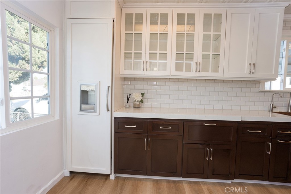 1118 East Joel Street Carson, CA 90745 - Photo 17 of 35 a kitchen with a sink and cabinets