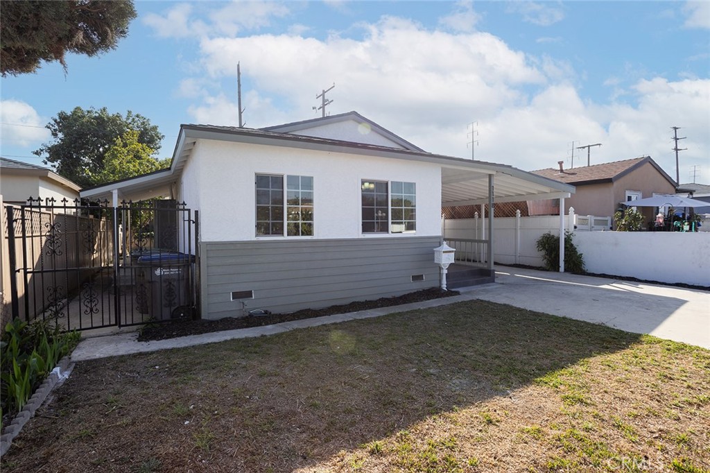 1118 East Joel Street Carson, CA 90745 - Photo 2 of 35 a view of a house with a yard