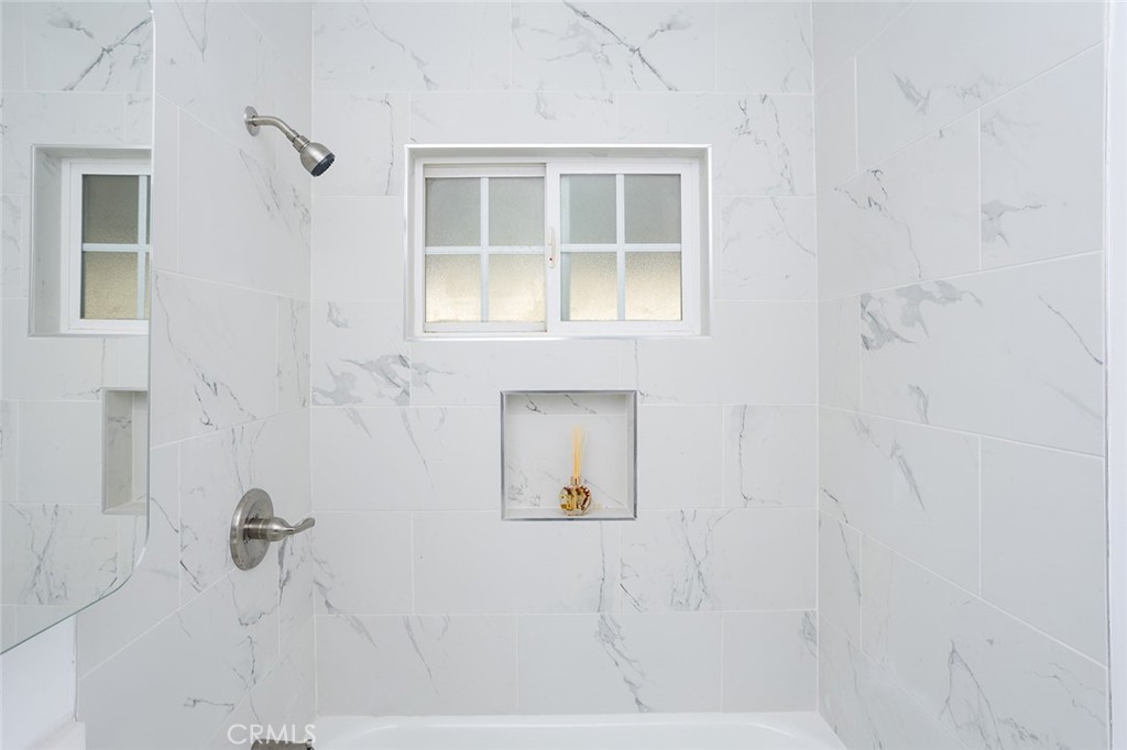 1118 East Joel Street Carson, CA 90745 - Photo 26 of 35 a view of a hallway with wooden floor and a window