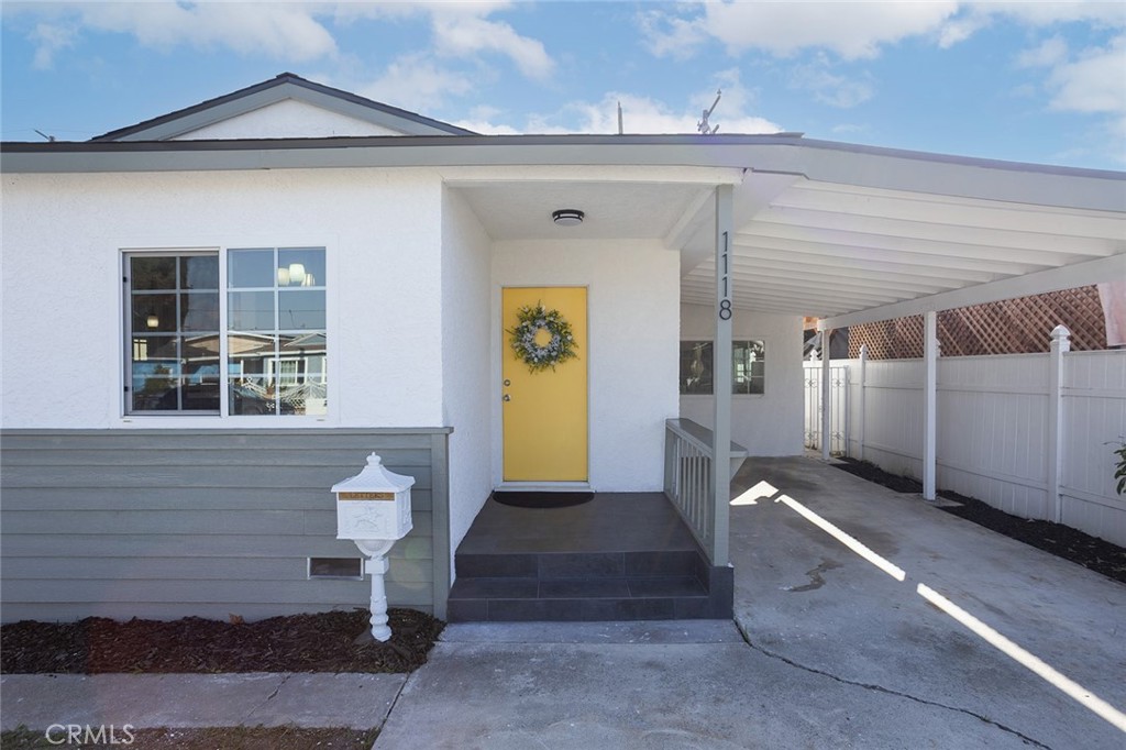 1118 East Joel Street Carson, CA 90745 - Photo 3 of 35 a front view of a house with a outdoor space