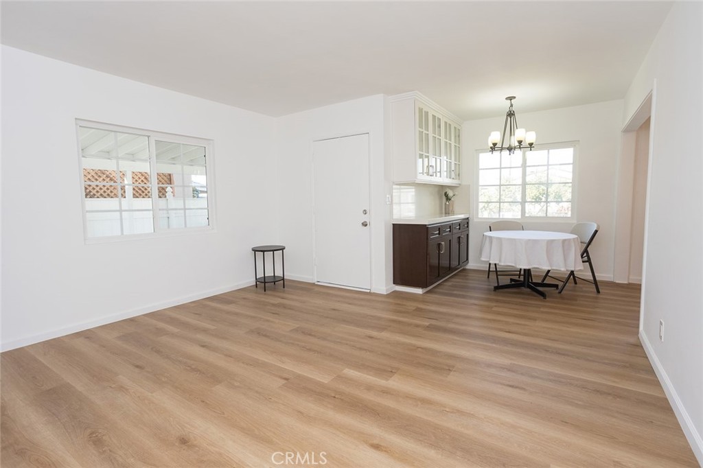 1118 East Joel Street Carson, CA 90745 - Photo 4 of 35 a view of a livingroom with furniture wooden floor and a window