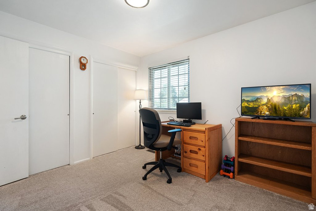 865 South 325 West Orem, UT 84058 - Photo 27 of 38 Light gray carpeted room with white walls and a window featuring horizontal blinds