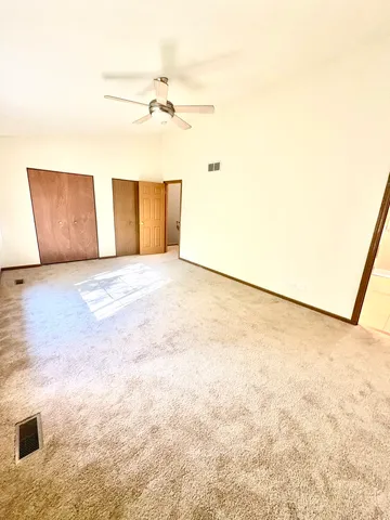 a view of a room with an empty space