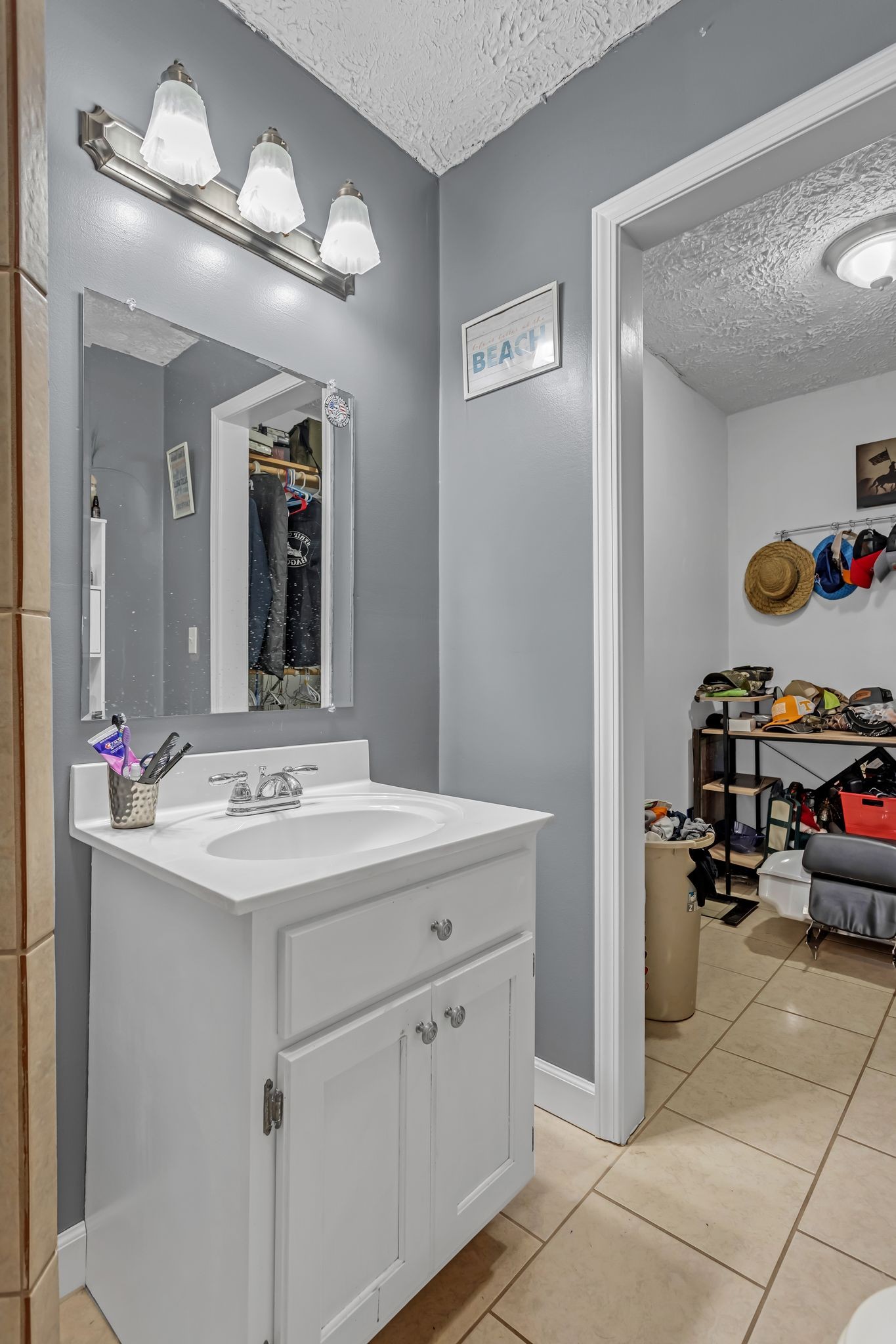 175 Reeves Road Hohenwald, TN 38462 - Photo 15 of 27 a kitchen with a sink and cabinets
