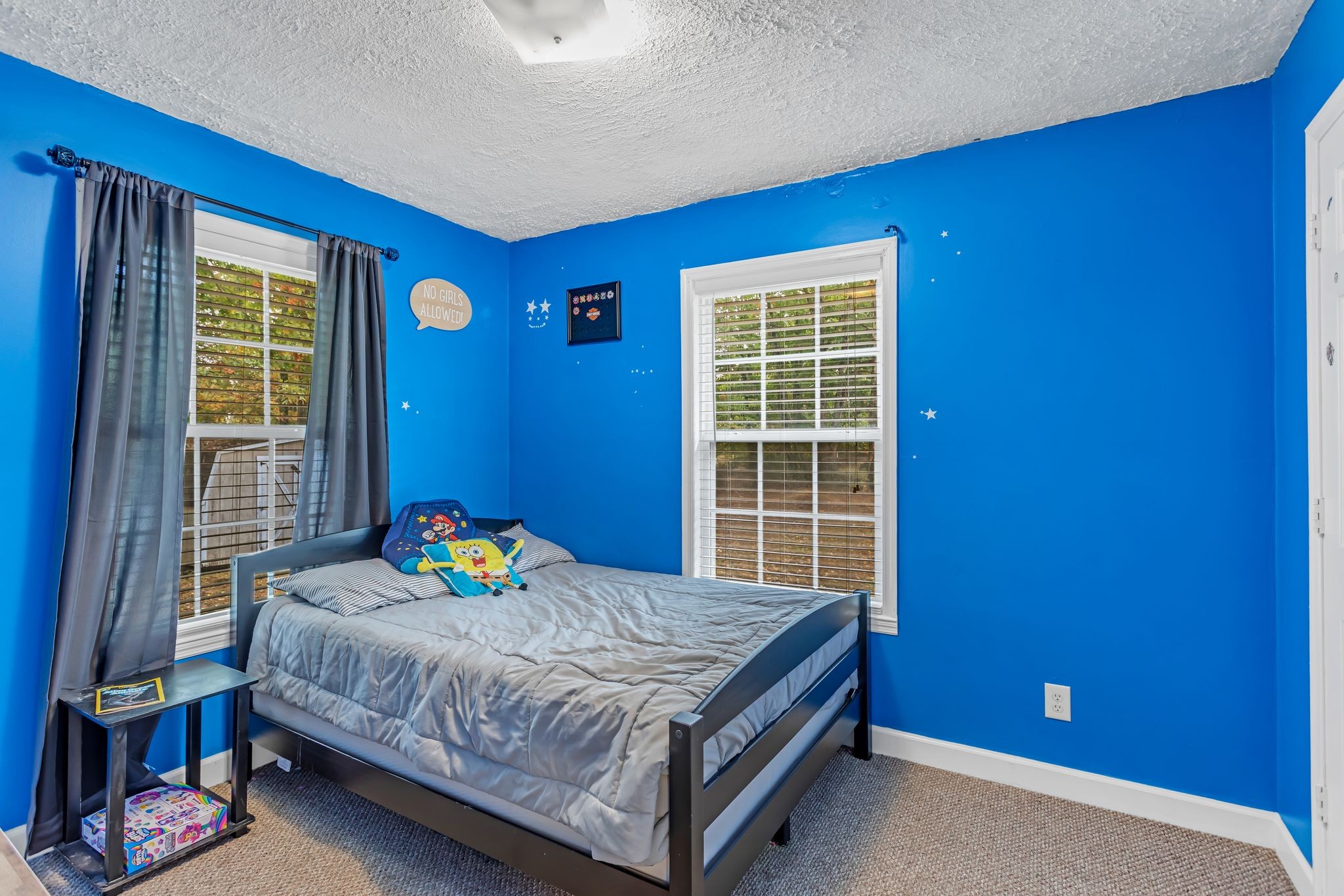 175 Reeves Road Hohenwald, TN 38462 - Photo 19 of 27 a bedroom with a bed and a window