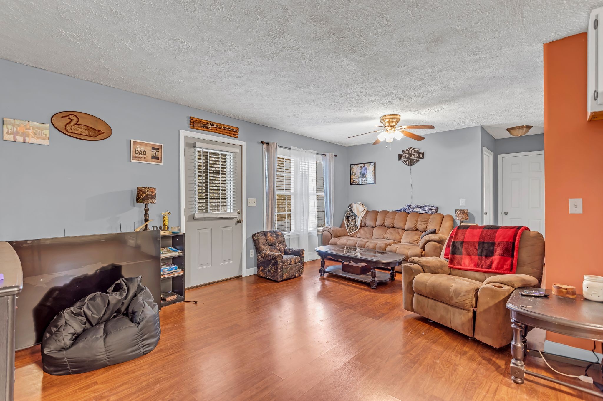 175 Reeves Road Hohenwald, TN 38462 - Photo 7 of 27 a living room with furniture and wooden floor