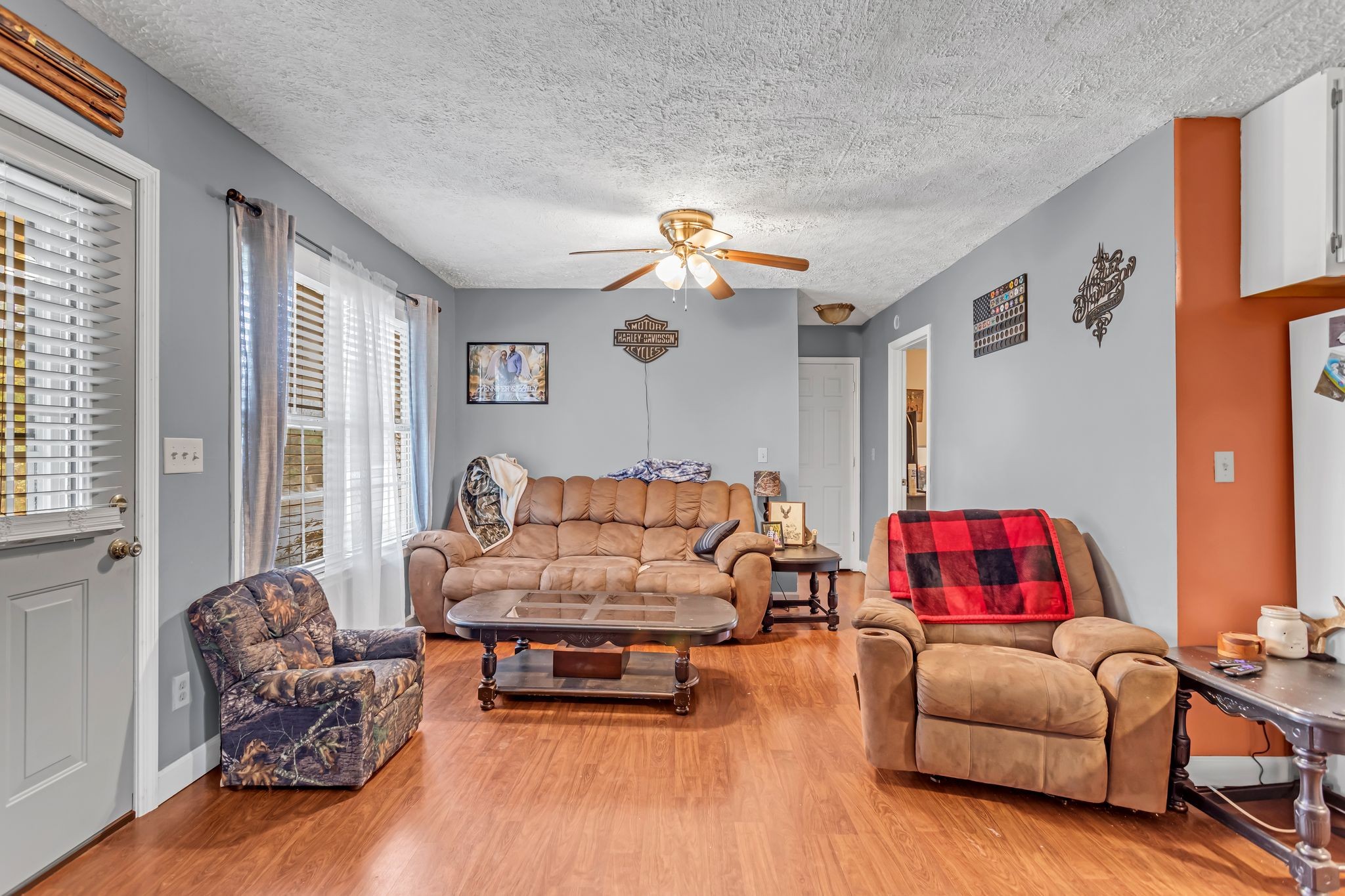175 Reeves Road Hohenwald, TN 38462 - Photo 8 of 27 a living room with furniture and a couch