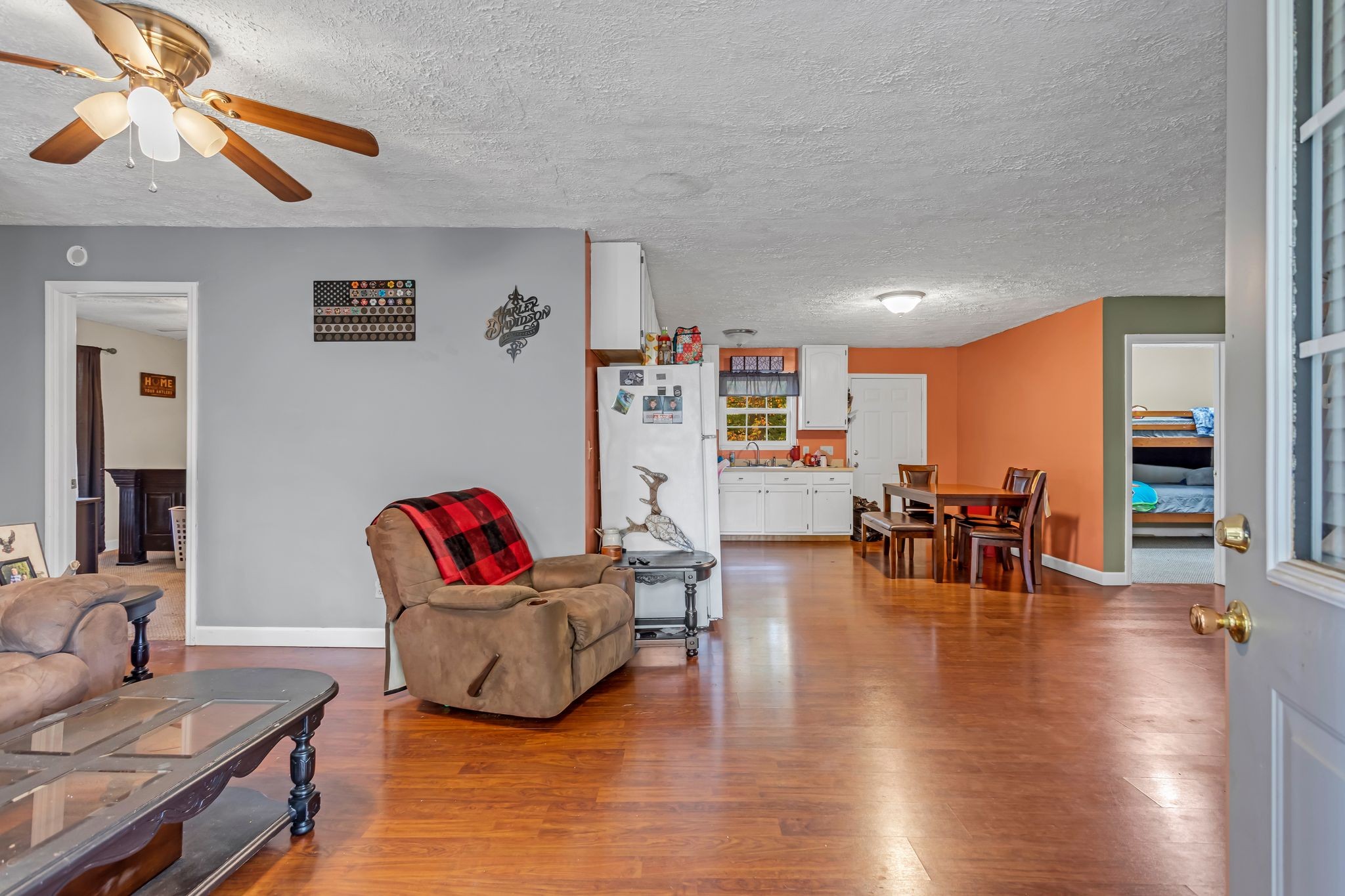 175 Reeves Road Hohenwald, TN 38462 - Photo 9 of 27 a living room with furniture and wooden floor
