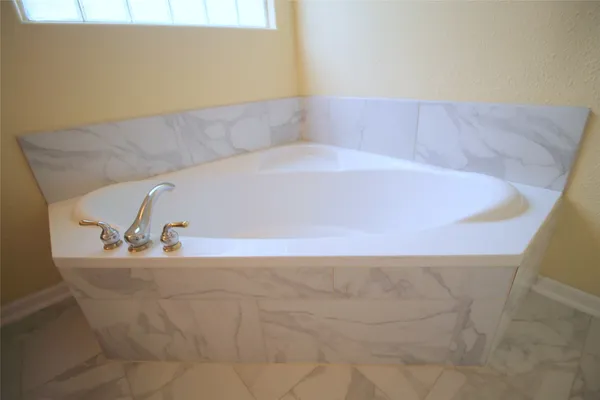 a bathroom with a bathtub