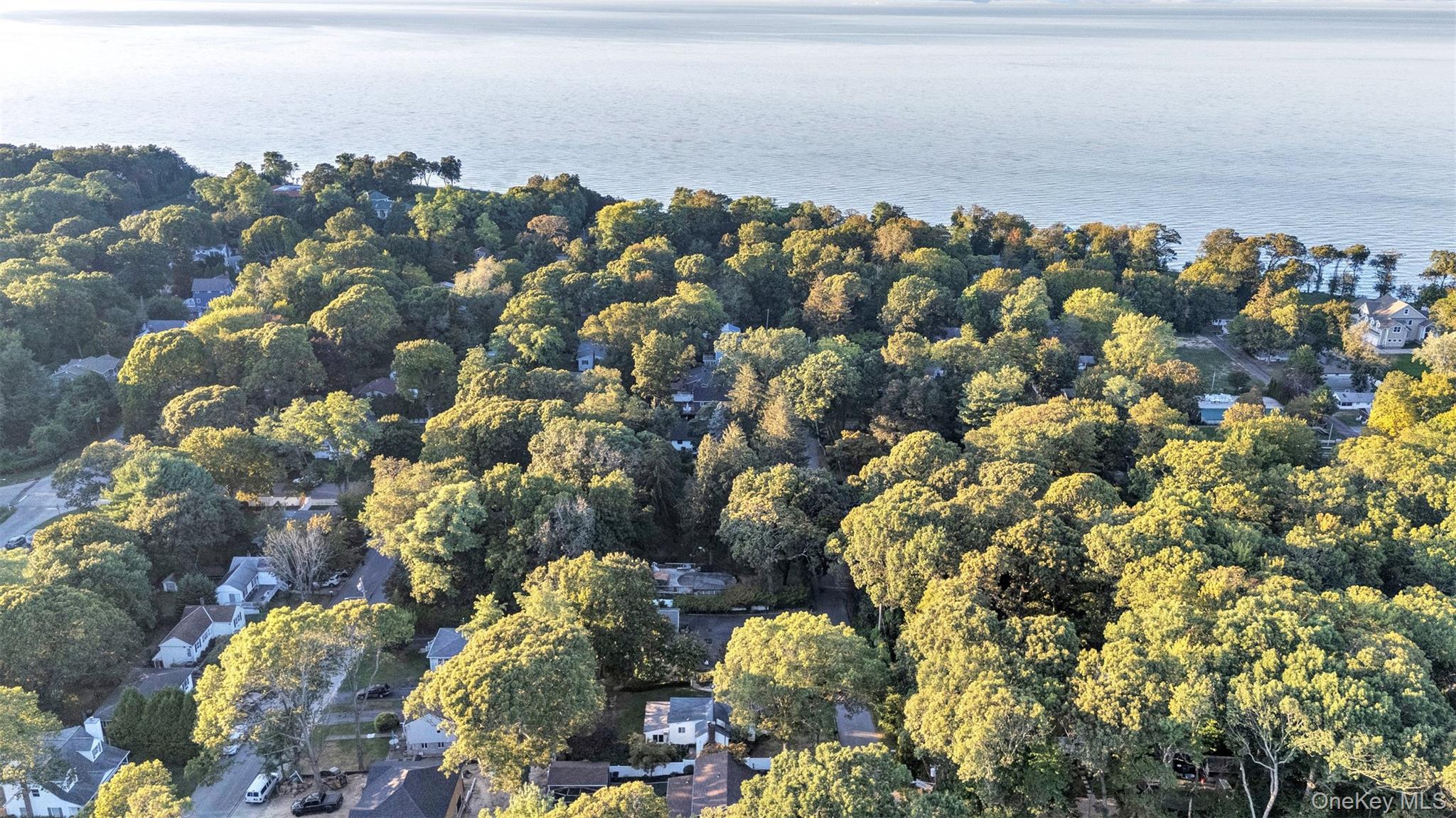 81 Beach Road Wading River, NY 11792 - Photo 15 of 25 Aerial view of property's location with a nearby body of water