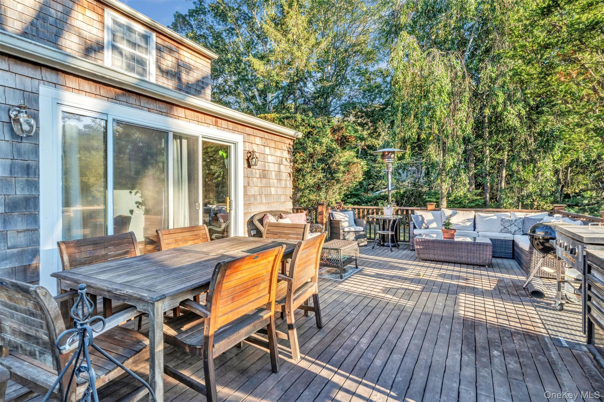 81 Beach Road Wading River, NY 11792 - Photo 3 of 25 Deck featuring an outdoor hangout area and outdoor dining area