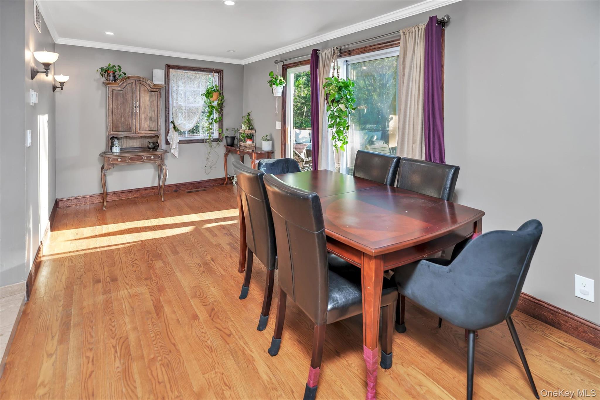 81 Beach Road Wading River, NY 11792 - Photo 4 of 25 Dining space with light wood-type flooring, ornamental molding, and recessed lighting