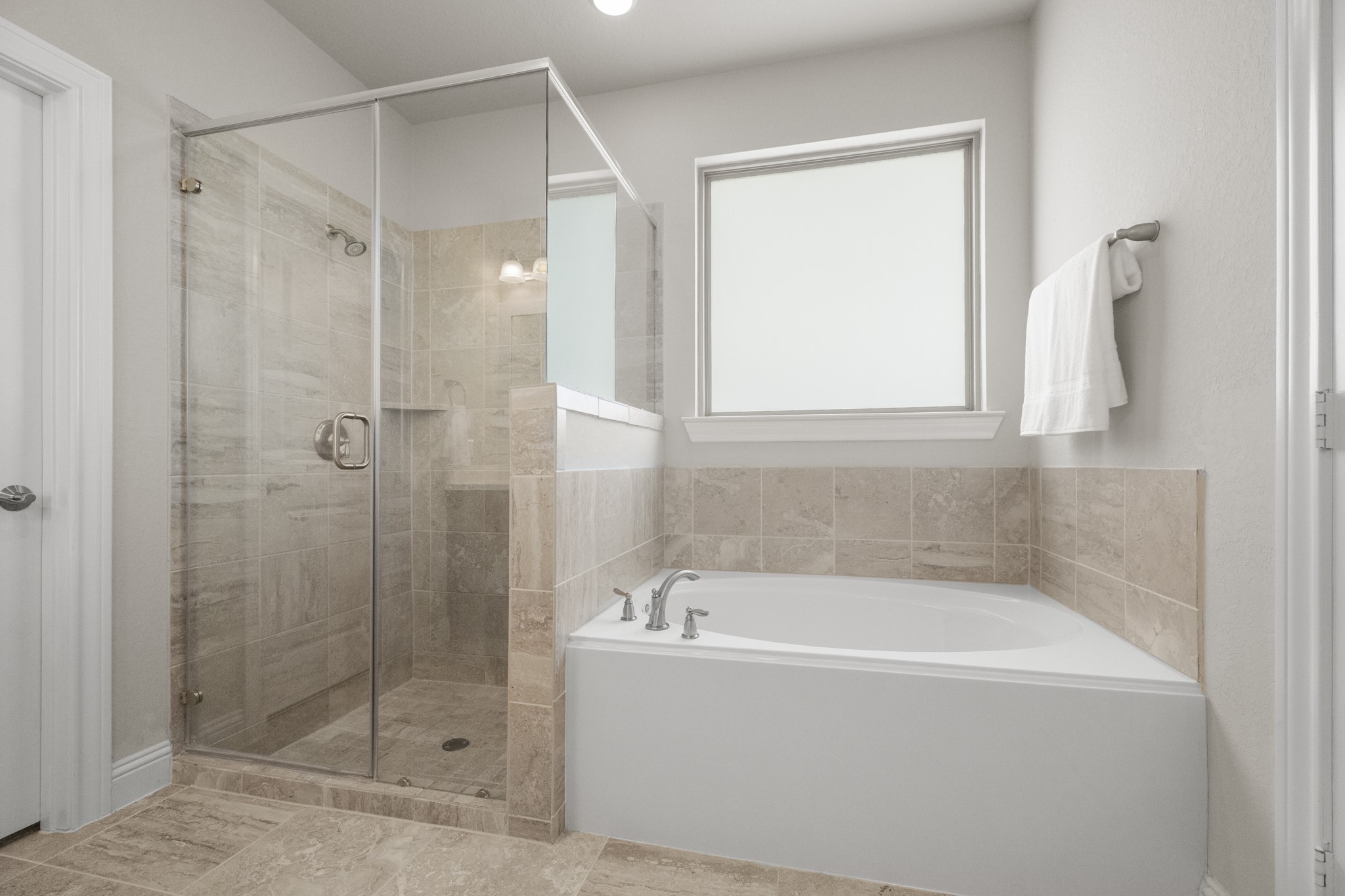 7502 Windsor Park Court Spring, TX 77379 - Photo 22 of 50 a white bath tub sitting next to a shower