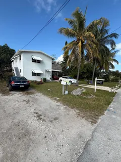a view of a house with a back yard