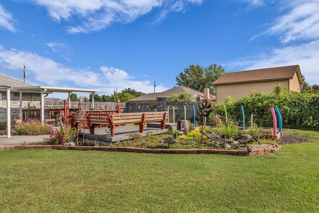 107 Fort Graham Circle Waco, TX 76705 - Photo 25 of 40 View of yard featuring a garden