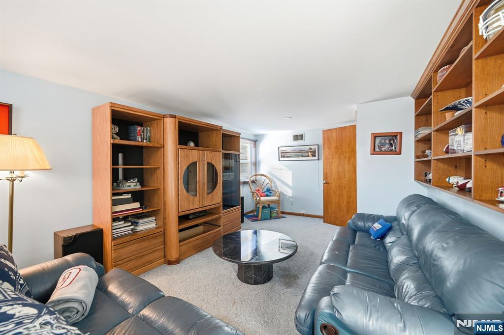 49 Mill Road Park Ridge, NJ 07656 - Photo 23 of 34 a living room with furniture and a couch