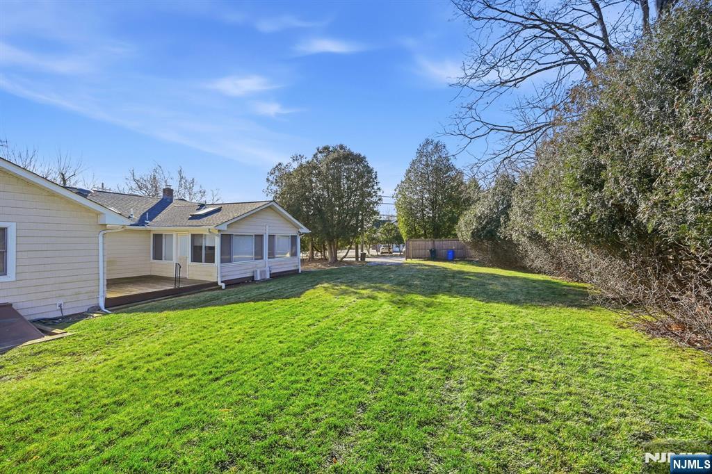 49 Mill Road Park Ridge, NJ 07656 - Photo 31 of 34 a view of house with a yard