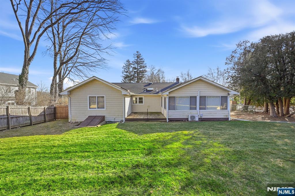 49 Mill Road Park Ridge, NJ 07656 - Photo 32 of 34 a front view of a house with a yard