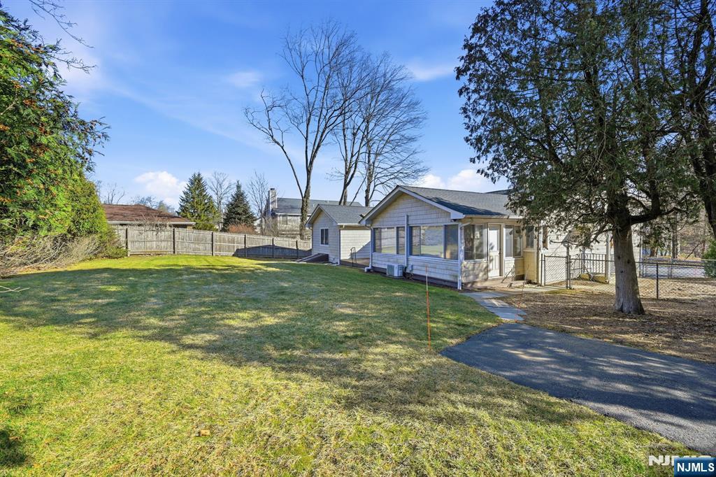 49 Mill Road Park Ridge, NJ 07656 - Photo 33 of 34 a front view of a house with garden