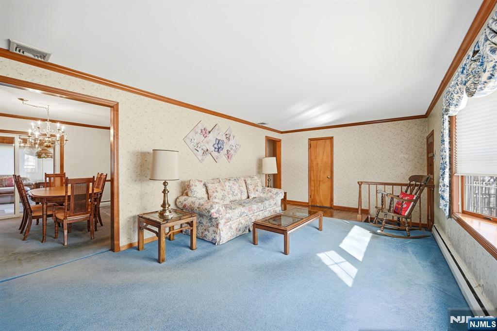 49 Mill Road Park Ridge, NJ 07656 - Photo 4 of 34 a living room with furniture and a large window