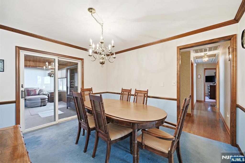49 Mill Road Park Ridge, NJ 07656 - Photo 5 of 34 a view of a dining room with furniture and wooden floor