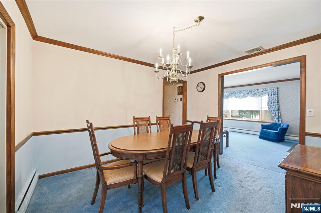 49 Mill Road Park Ridge, NJ 07656 - Photo 6 of 34 a view of a dining room with furniture and window