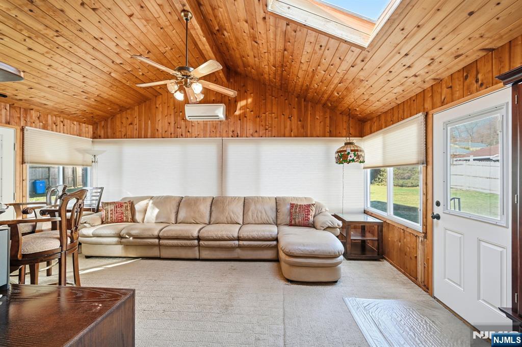 49 Mill Road Park Ridge, NJ 07656 - Photo 10 of 34 a living room with furniture and a large window