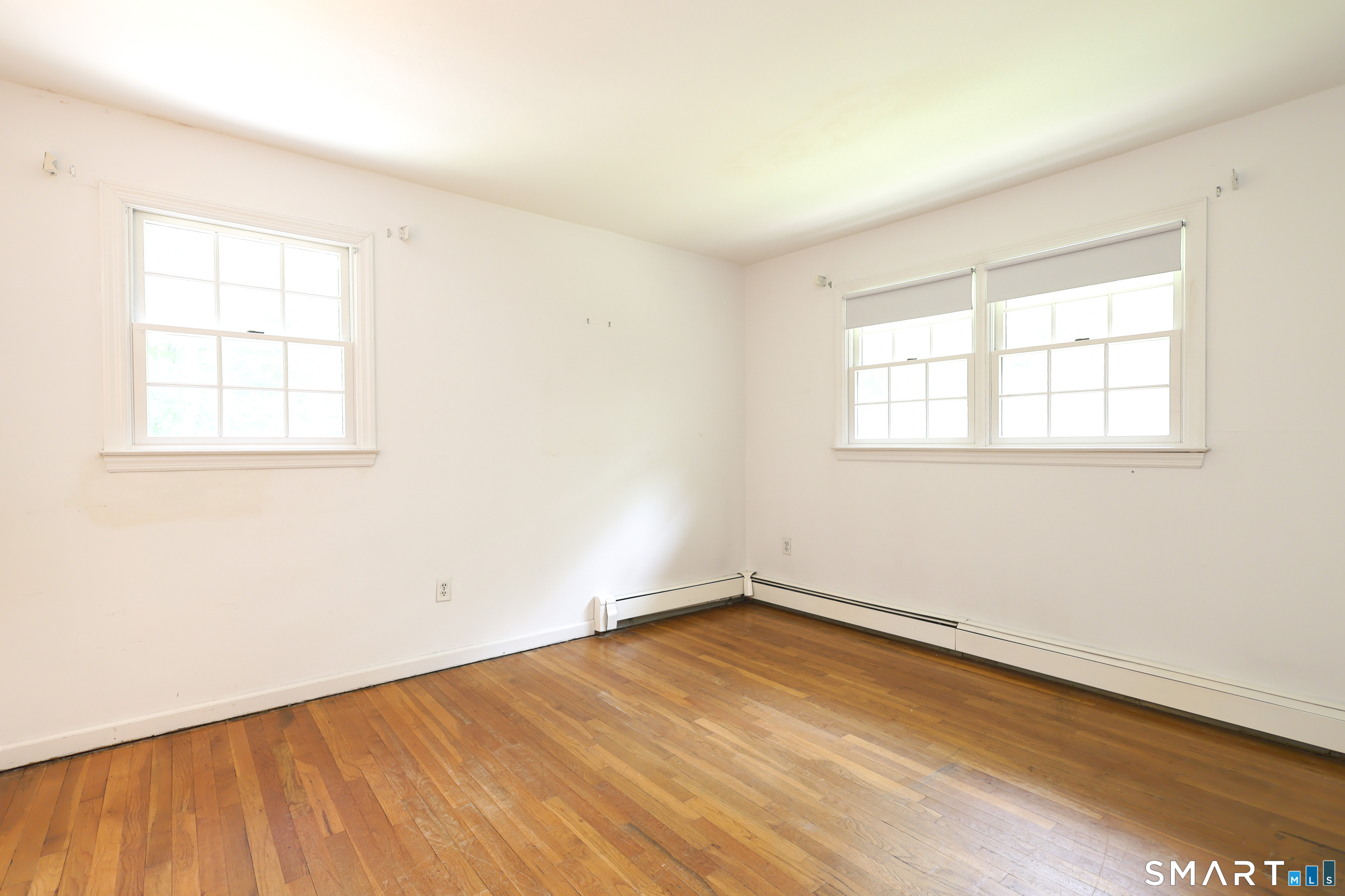 145 Wilton Road East Ridgefield, CT 06877 - Photo 25 of 37 Bedroom #3 with hardwood floors.