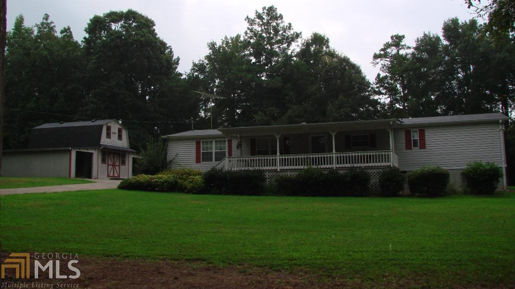 2145 Bates Road, Unit 2 Concord, GA 30206 - Photo 1 of 1 a front view of a house with a garden