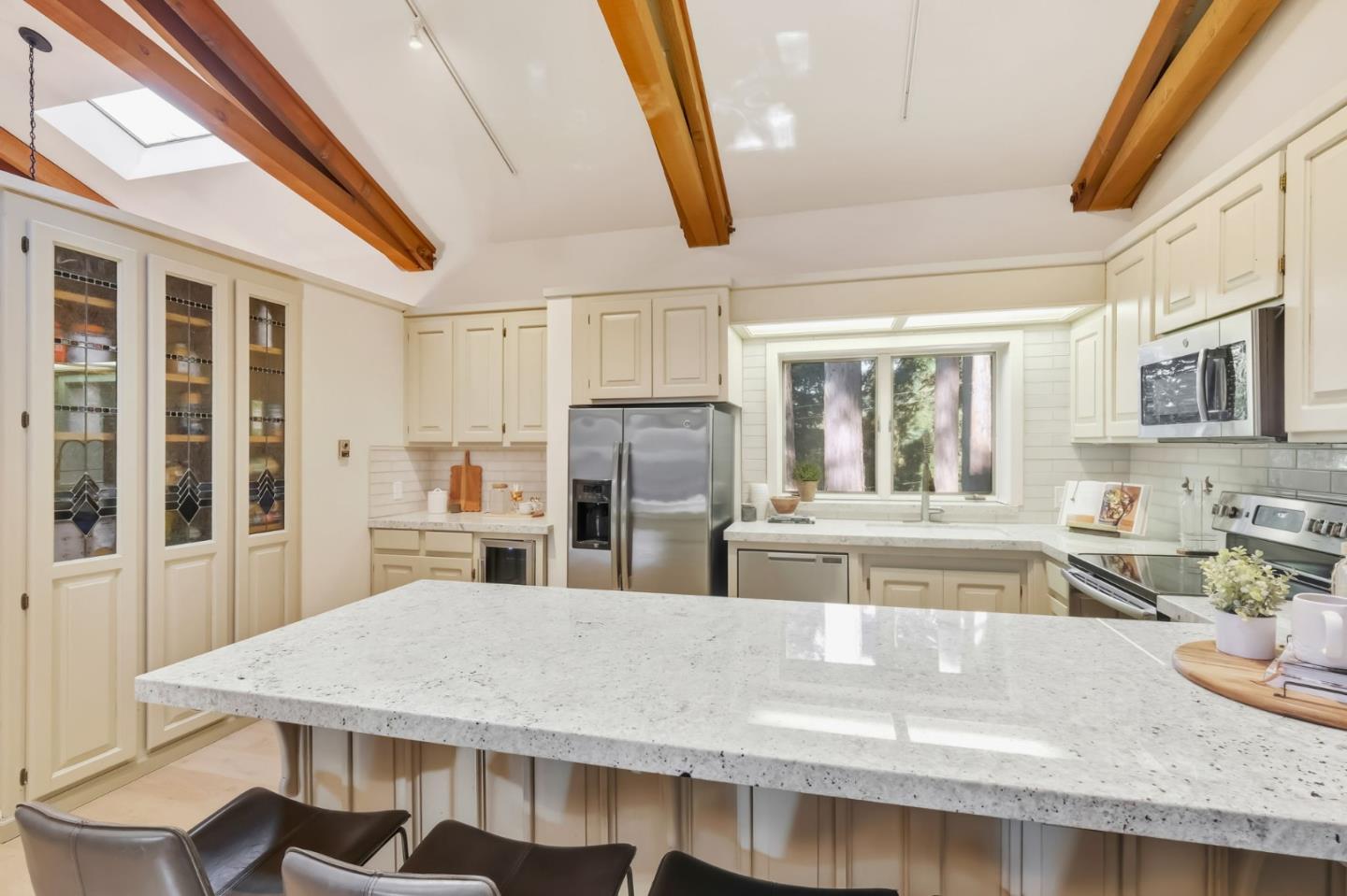 620 Condor Avenue Ben Lomond, CA 95005 - Photo 12 of 42 a large kitchen with granite countertop a sink and a refrigerator