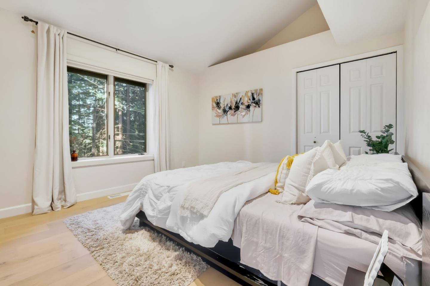 620 Condor Avenue Ben Lomond, CA 95005 - Photo 18 of 42 a bedroom with a bed and a window