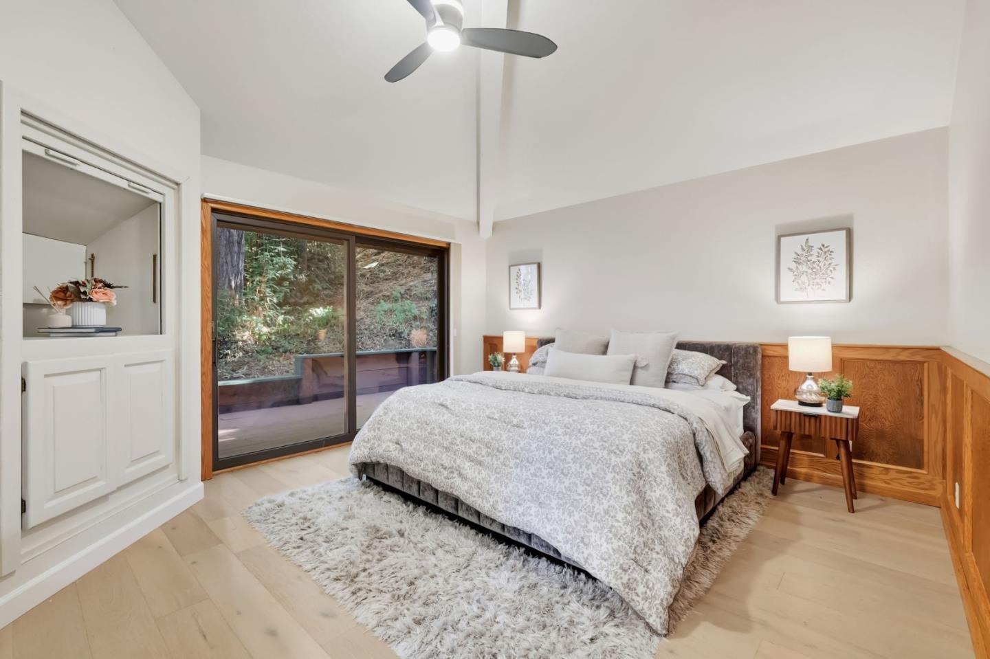 620 Condor Avenue Ben Lomond, CA 95005 - Photo 22 of 42 a spacious bedroom with a bed and a large window