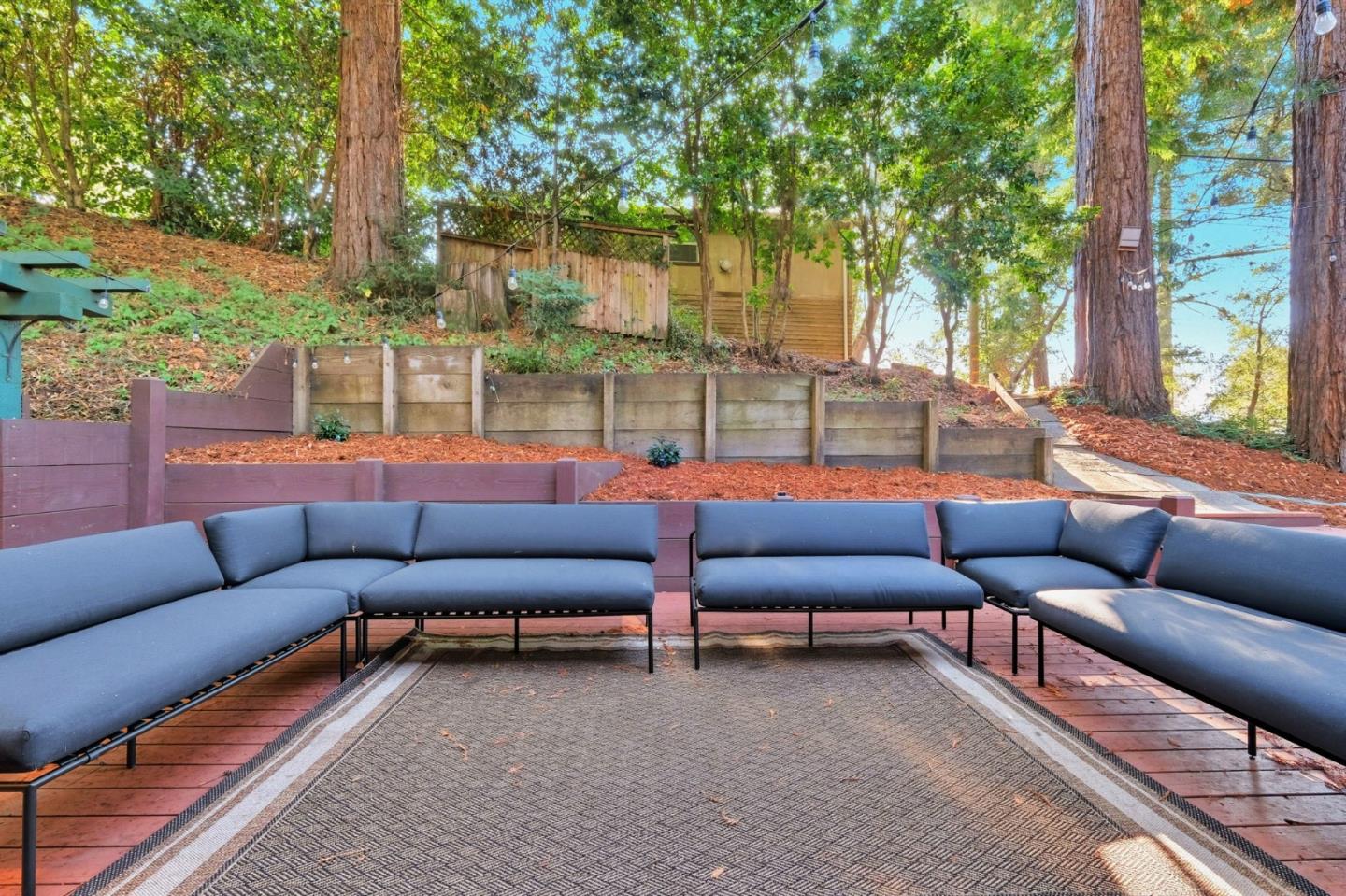 620 Condor Avenue Ben Lomond, CA 95005 - Photo 32 of 42 a outdoor living room with patio a red couch