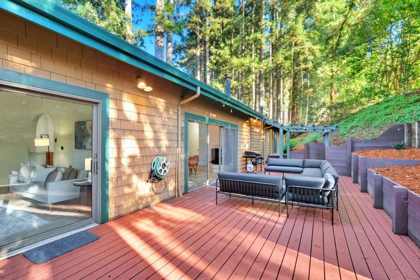 620 Condor Avenue Ben Lomond, CA 95005 - Photo 33 of 42 a outdoor living space with patio furniture and wooden floor