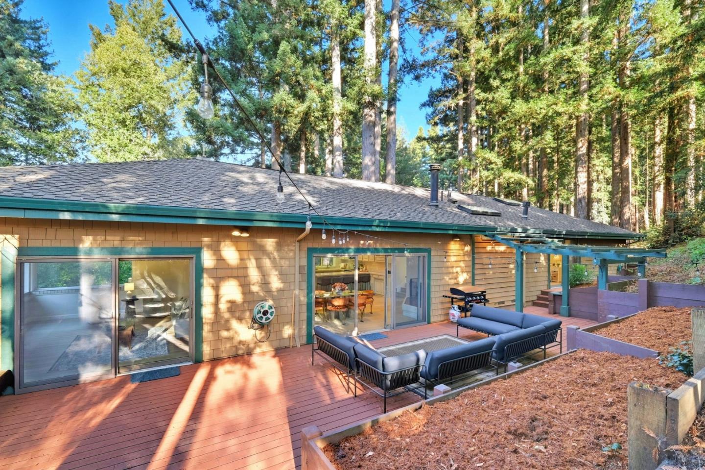 620 Condor Avenue Ben Lomond, CA 95005 - Photo 34 of 42 an outdoor space with furniture and umbrella