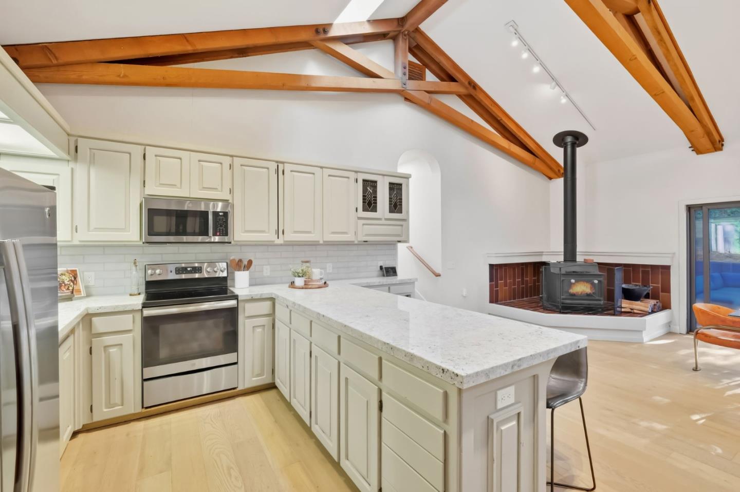 620 Condor Avenue Ben Lomond, CA 95005 - Photo 10 of 42 a kitchen with stainless steel appliances a stove microwave and a sink