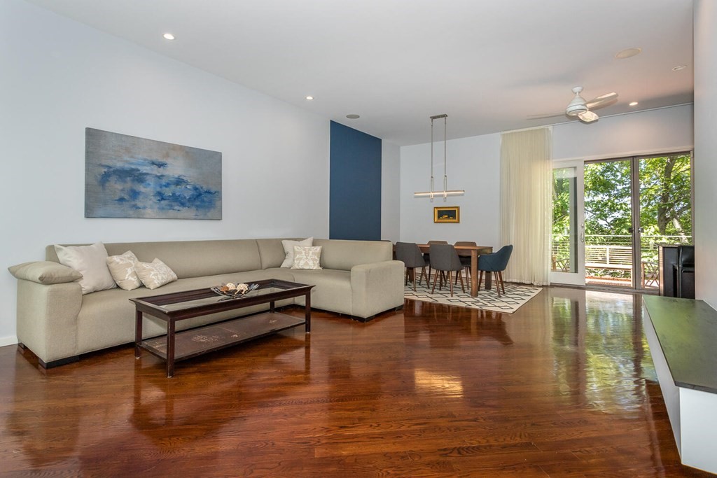 12 Endicott Place Canton, MA 02021 - Photo 2 of 17 a living room with furniture and a large window