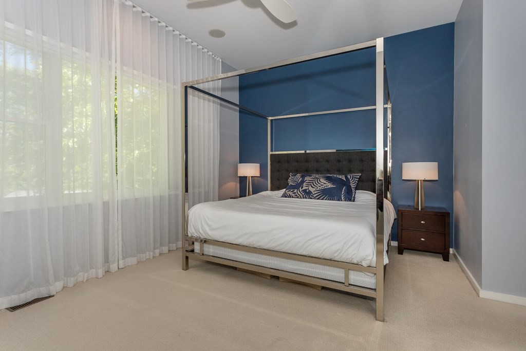 12 Endicott Place Canton, MA 02021 - Photo 8 of 17 a bedroom with a bed and a table