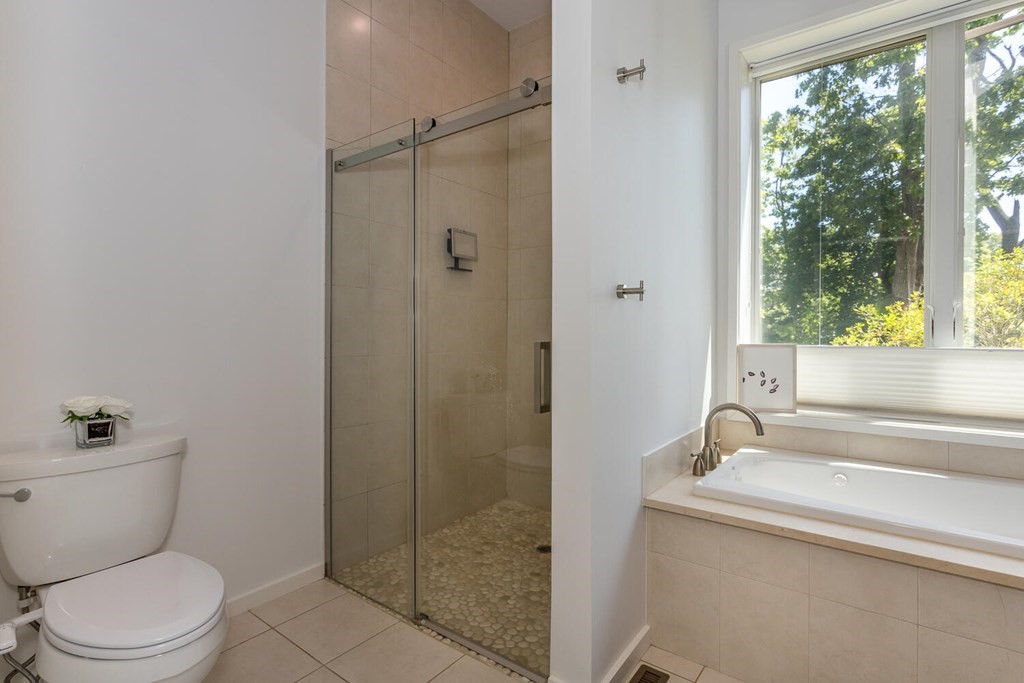 12 Endicott Place Canton, MA 02021 - Photo 10 of 17 a bathroom with a sink a toilet and shower