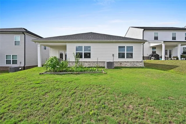 front view of a house with a yard